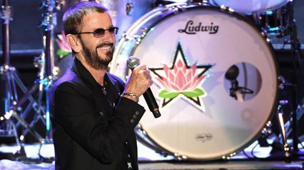 Ringo Starr o<em></em>nstage in front of drums