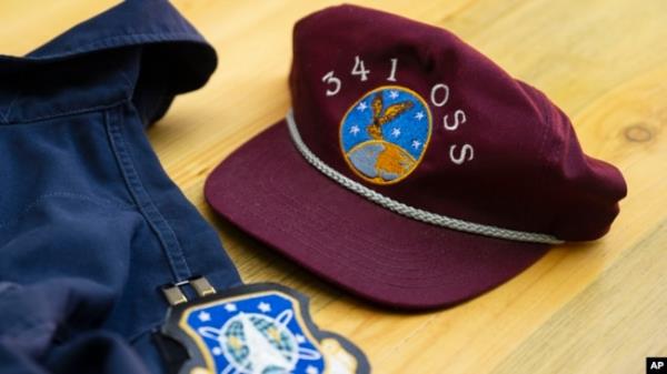Portions of Air Force Capt. Jason Jenness' uniform are displayed on a table during an interview with the Associated Press in Missoula, Mont., on Aug., 26, 2023.