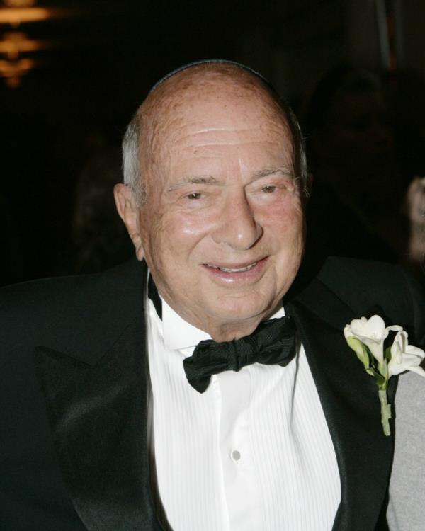 S. Daniel Abraham smiling in tuxedo at 2006 event.