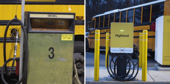 A diesel pump, left, and an electric charger station, right, sit in a bus lot. (AP Photo/Tom Brenner)