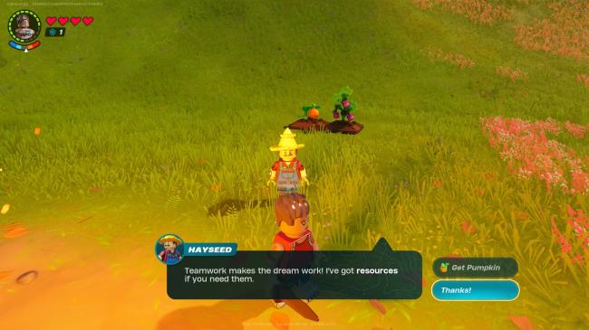 A player in front of a cave in the desert biome in Lego Fortnite.