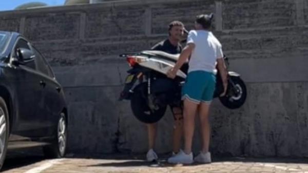 Two men have filmed themselves moving a moped from a parking spot at Bo<em></em>ndi Beach. Picture: Tik Tok