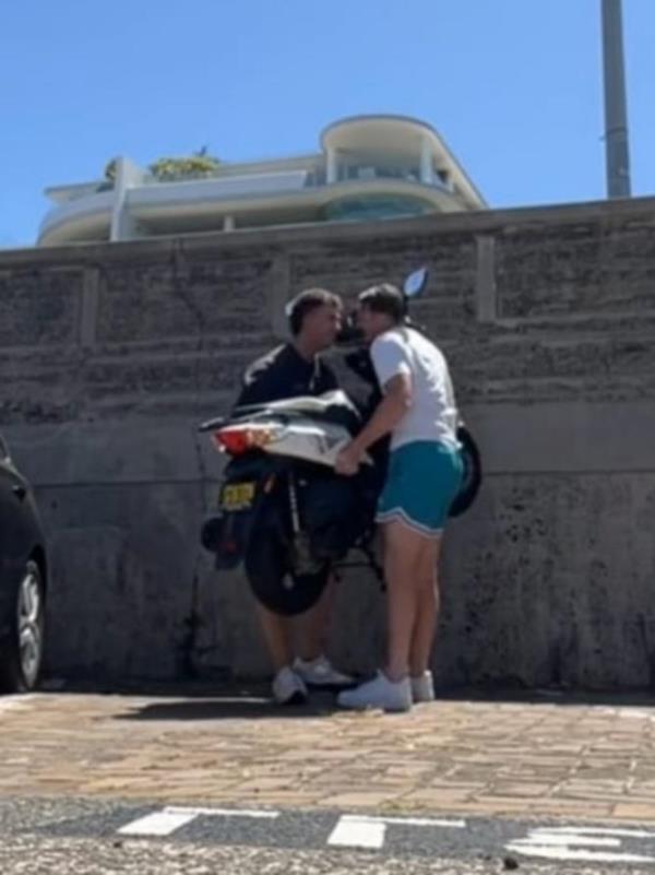 Two men have filmed themselves moving a moped from a parking spot at Bo<em></em>ndi Beach. Picture: Tik Tok