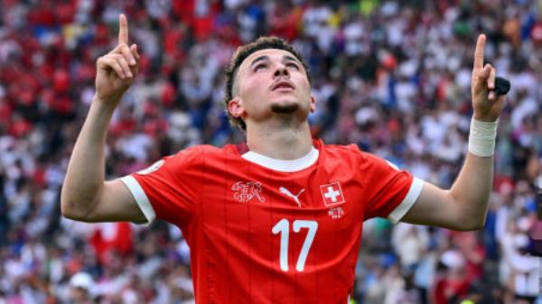 Reigning champions Italy sent packing by super Swiss strikes
