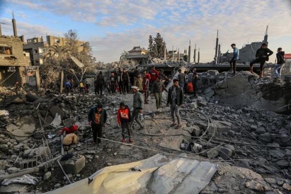 Civil defense teams and Palestinians co<em></em>ntinue their search and rescue operations after an Israeli attack on the Omar Bin Abdulaziz Mosque in Rafah, Gaza on January 24, 2024. (Photo by Abed Rahim Khatib/Anadolu via Getty Images)