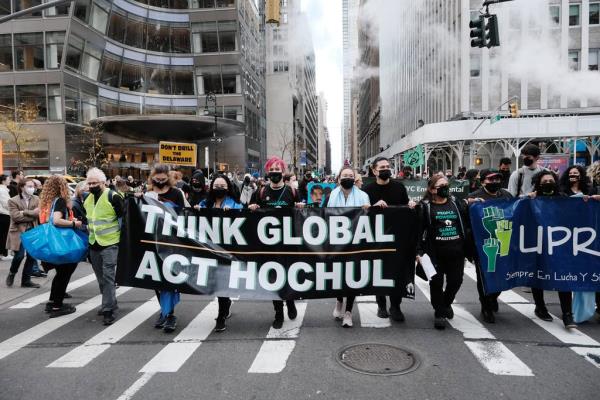 Hundreds of climate protesters walk from Times Square to New York Governor Kathy Hochul’s office to demand more action against climate change on on November 13, 2021 in New York City.