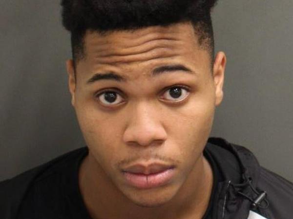 Keith Melvin Moses, 19, is accused of killing a 38-year-old woman, a 9-year-old girl and a 24-year-old TV journalist in a spate of shootings in Orlando's Pine Hills neighborhood on Wednesday, Feb. 23, 2023.