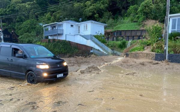 Cyclone Gabrielle flooded Tararu Road and brought down much of the cliff mud.