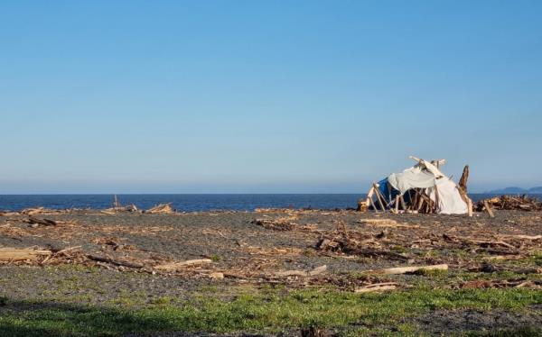 A man whose Esk Valley home was flooded was living in a shack on the Napier shore line.