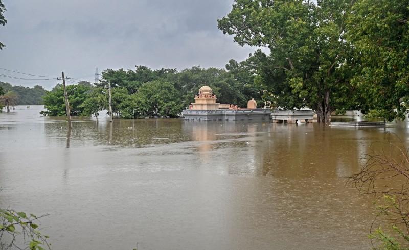 The Parashurama Temple in Nanjangud of Mysuru district is almost submerged following release of water from Kabini dam on Friday. 
