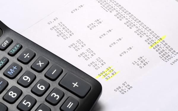 Euro Pay slip and calculator, close up for payroll or salary background, french mention Net to pay