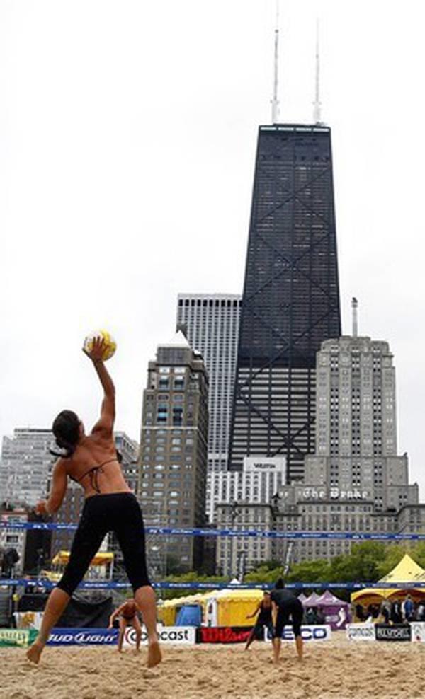 Morgan Flarity serves during a qualifier of the AVP Chicago Open on Aug. 27, 2009, at Oak Street Beach.