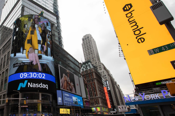 A mo<em></em>nitor displays Whitney Wolfe Herd ringing the opening bell during Bumble’s  initial public offering  in front of the Nasdaq market site in New York on February 11, 2021.