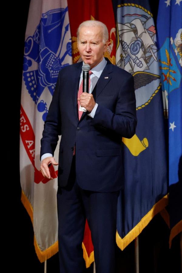 U.S. President Joe Biden speaks before a screening of 