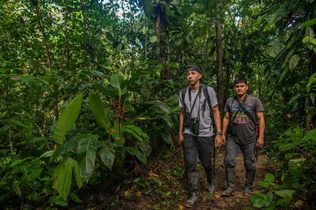 Park guards Jose? An?apa and Bryan Tamayo in Canande? reserve. Photo credit: Scott Trageser
