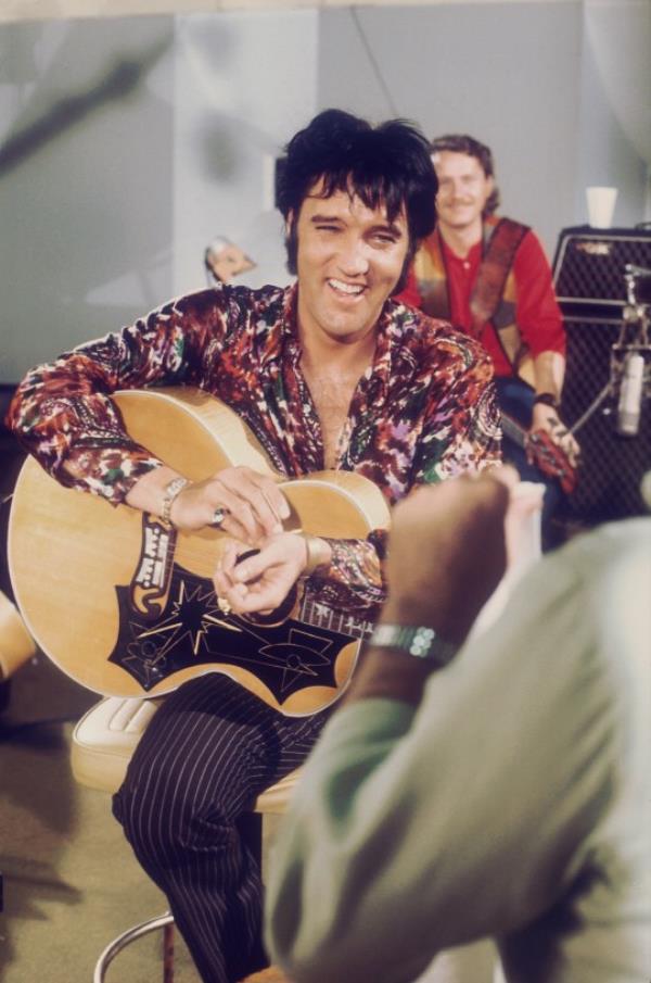 Embargoed to 0001 Thursday January 4 NO RESALE, NO ARCHIVE, NO NEW USAGE AFTER TWO WEEKS Undated handout photo issued by Elvis Presley Enterprises LLC of Elvis Presley in a recording studio. An Elvis Presley immersive co<em></em>ncert experience is coming to London, with an AI King of rock'n'roll performing on stage. Issue date: Thursday January 4, 2024. PA Photo. Elvis Evolution will premiere in the capital in November 2024, using AI and holographic projection to bring the star to life from thousands of his perso<em></em>nal photos and home-video footage. See PA story SHOWBIZ Elvis. Photo credit should read: Elvis Presley Enterprises LLC/PA Wire NOTE TO EDITORS: This handout photo may o<em></em>nly be used in for editorial reporting purposes for the co<em></em>ntemporaneous illustration of events, things or the people in the image or facts mentio<em></em>ned in the caption. Reuse of the picture may require further permission from the copyright holder.