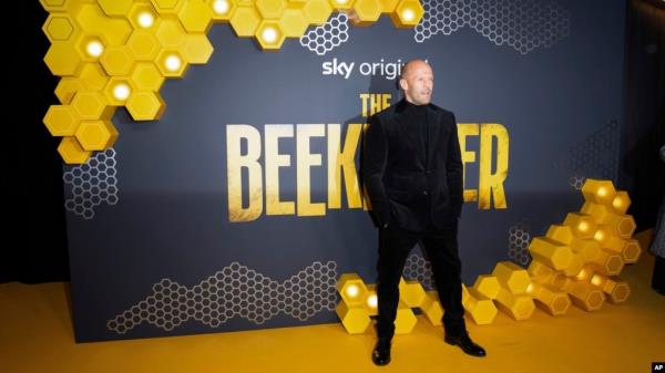FILE - Jason Statham poses for photographers upon arrival at the UK premiere of the film 'The Beekeeper' on Jan. 10, 2024 in London. (Scott A Garfitt/Invision/AP)