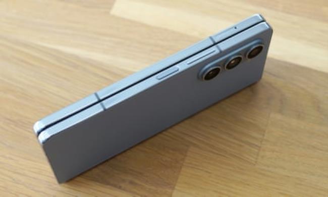 The Samsung Galaxy Z Fold 5 shut and stood on its hinge side.
