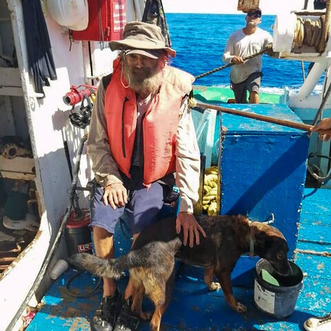 Tim Shaddock and Bella after they were rescued