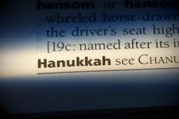 Golden fried potato latkes in a cast iron skillet