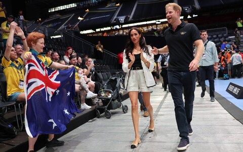 Prince Harry and Meghan arrive at the event 