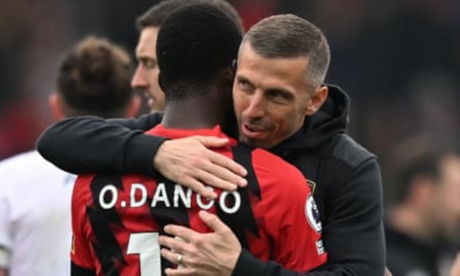 Gary O’Neil embraces Dango Ouattara after the win at home to Leeds in April that secured Premier League safety for Bournemouth