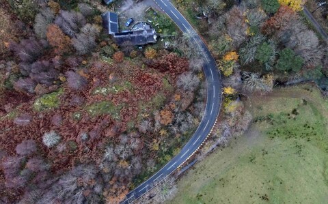 Drone photo of the corner wher<em></em>e the car left the road and ended up in a water filled culvert