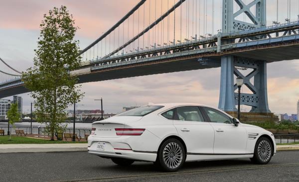 genesis electrified g80 front three quarter view