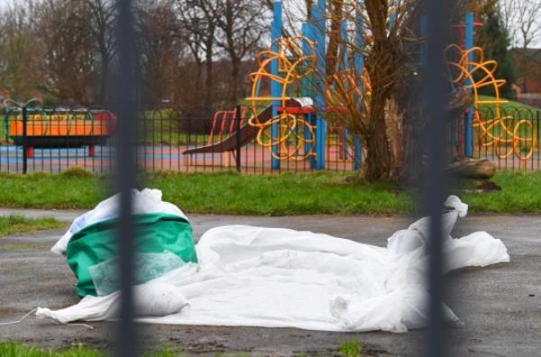 Police forensic cover at cordo<em></em>ned off green space,on Childwall Valley Road.(Pic Andrew Teebay)