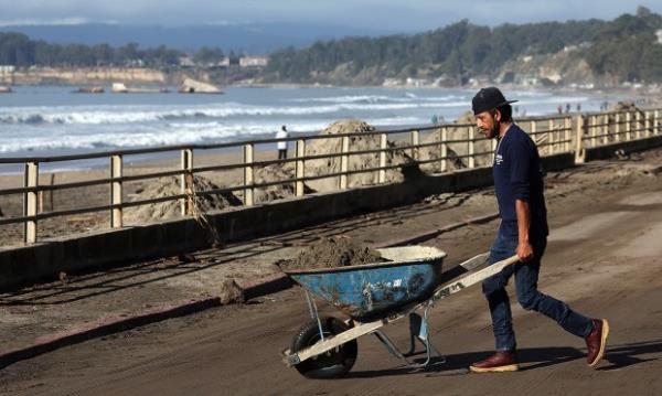 Storm cleanup this week along Beach Drive in Rio Del...