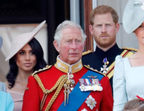 The trio are pictured together in 2018, prior to 
