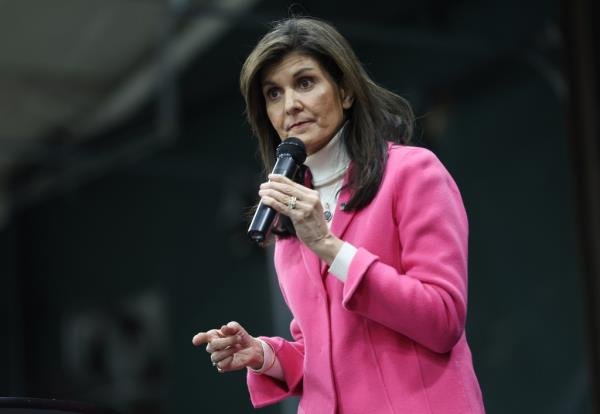 Republican presidential candidate former U.N. Ambassador Nikki Haley visits a caucus site at the Horizon Event Center on January 15, 2024 in Clive, Iowa.