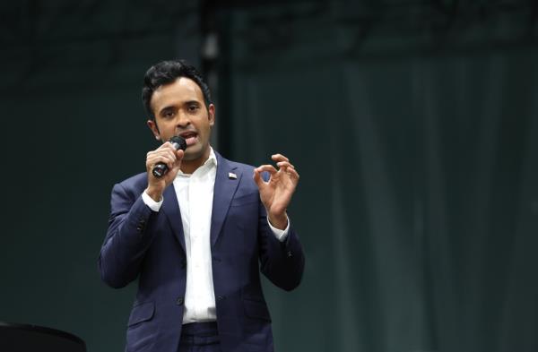 Republican presidential candidate Vivek Ramaswamy speaks to voters at a caucus site at the Horizon Event Center on January 15, 2024 in Des Moines, Iowa. 