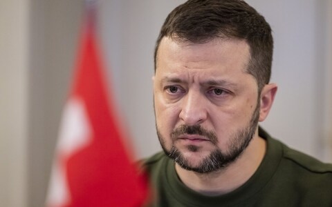 Zelensky looks on during bilateral talks with the Swiss delegation in Kehrsatz