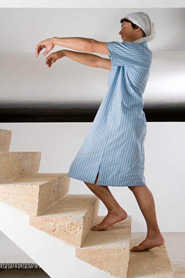 One must walk like a zombie when sleepwalking. Credit: Image Source / Getty