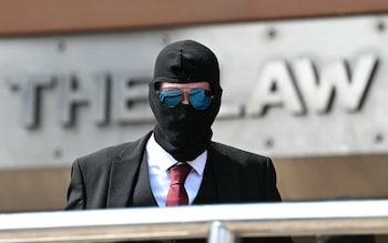 Daniel Graham, wearing a face-covering, leaves after appearing at Newcastle Magistrates' Court in Newcastle-Upon-Tyne, north east England on May 15, 2024, wher<em></em>e he faced two counts of criminal damage following the felling of the Sycamore Gap tree, in September 2023.