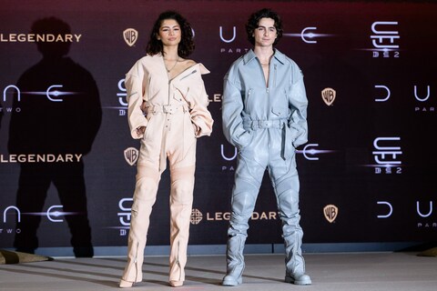 Zendaya and Timothée Chalamet in matching Juun J jumpsuits at the Dune: Part Two press co<em></em>nference  in Seoul, South Korea