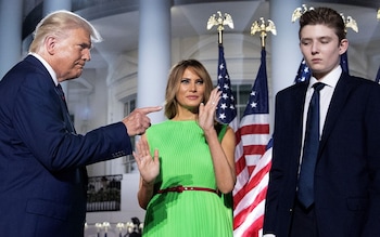 From left to right: Do<em></em>nald Trump, Melania Trump and Barron Trump, pictured at the White House in August 2020