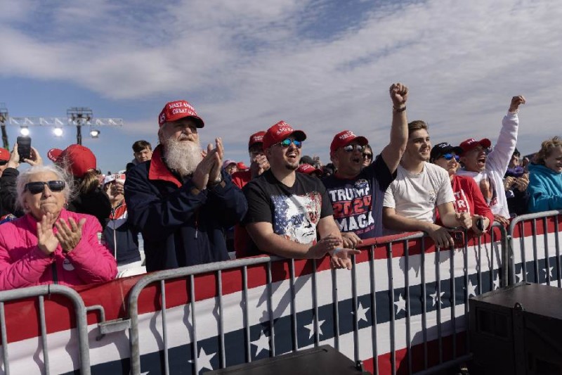 Supporters of former President Do<em></em>nald Trump cheer as Trump arrives for a Buckeye Values PAC Rally in Dayton, Ohio on March 16, 2024.