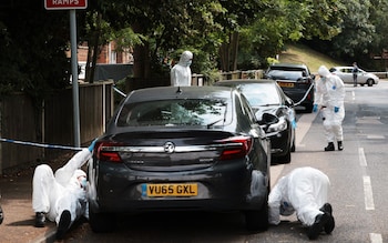 Forensic officers search near the scene at Sally Port  after a soldier in uniform was stabbed on Tuesday