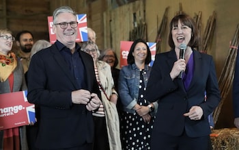 Rachel Reeves, the shadow chancellor, takes to the microphone at Heath Farm, Swerford, alo<em></em>ngside Sir Keir Starmer