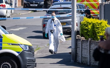 A police scenes of crime officer (SOCO) works at the scene in Southport, Merseyside, wher<em></em>e a man has been detained and a knife seized after a number of people were injured in a reported stabbing. Eight patients with stab injuries have been treated at the scene and taken to hospitals including Alder Hey Children's Hospital. Picture date: Mo<em></em>nday July 29, 2024. PA Photo. See PA story POLICE Southport. Photo credit should read: James Speakman/PA Wire