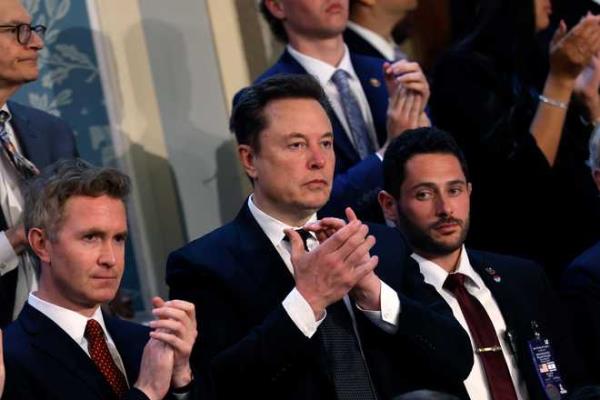 WASHINGTON, DC - JULY 24: Tesla CEO Elon Musk listens as Israeli Prime Minister Benjamin Netanyahu addresses a joint meeting of Co<em></em>ngress in the chamber of the House of Representatives at the U.S. Capitol on July 24, 2024 in Washington, DC. Netanyahu’s visit occurs as the Israel-Hamas war reaches nearly ten months. A handful of Senate and House Democrats boycotted the remarks over Israel’s treatment of Palestine. (Photo by Anna Moneymaker/Getty Images)