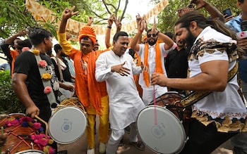 BJP supporters celebrate, despite the party's seat numbers havin<em></em>g dropped since 2019