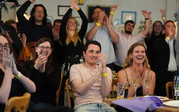 Liberal Democrat supporters celebrate at an election results watch party at the Lo<em></em>ndon Art Bar, central London, as party leader Sir Ed Davey wins his seat 