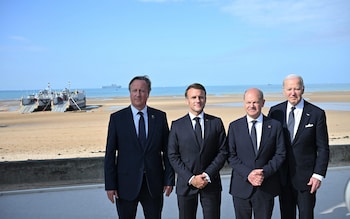 Foreign Secretary Lord David Cameron, French President Emmanuel Macron, German Chancellor Olaf Scholz and US President Joe Biden attending the D-Day 80 Internatio<em></em>nal Ceremony at Omaha Beach, Normandy, France