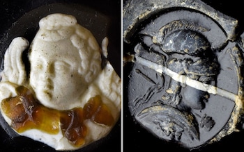 A cameo showing Cupid and an intaglio bust of Minerva
