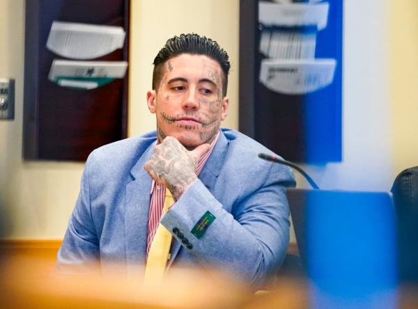Wilson's body is covered in tattoos — including a swastika on his face.