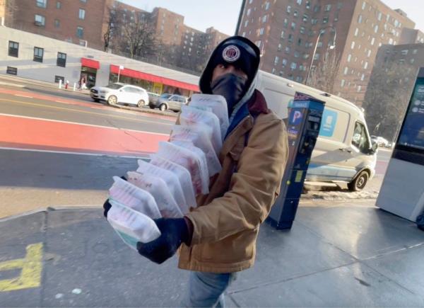 A man spotted stealing steaks from a Manhattan Trader Joe's store on Feb. 8, 2022.