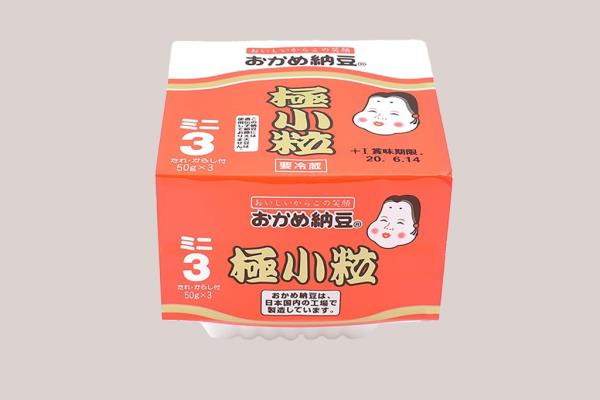 an orange package of fermented soybeans with Japanese lettering